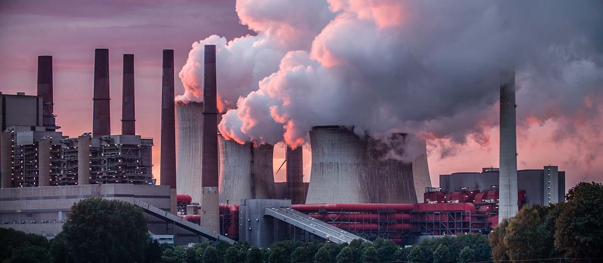 Industry emitting carbon dioxide contributing to global warming