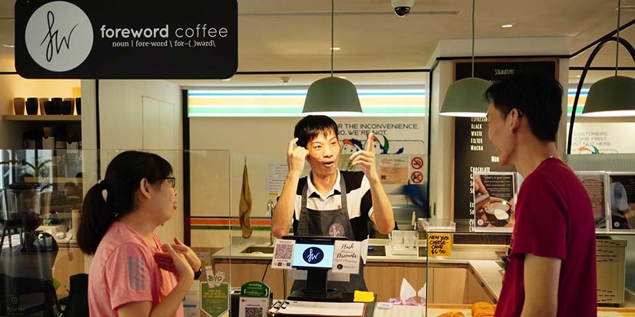 A Foreword Coffee staff manning the cashier