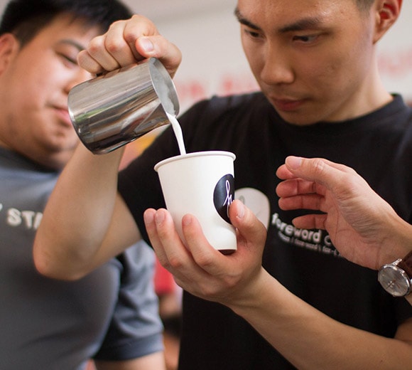 Foreword Coffee staff preparing coffee_580x520