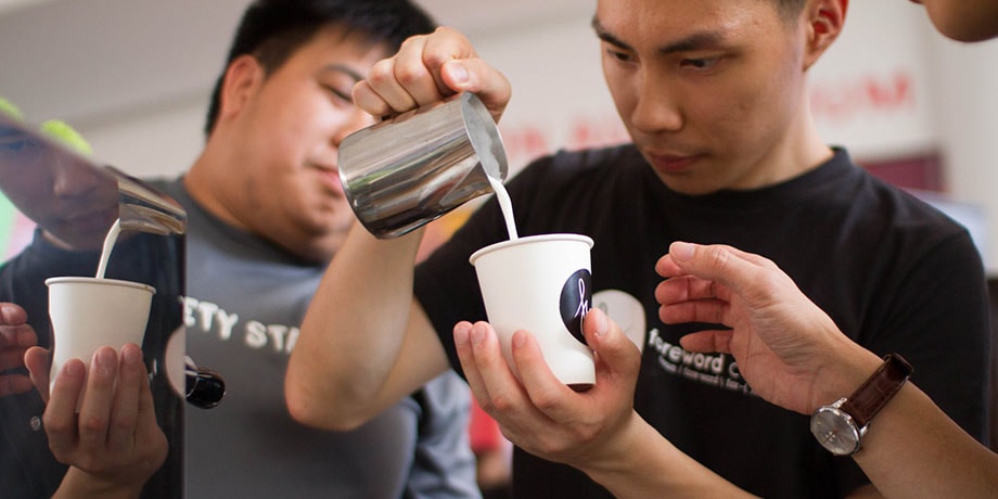 A Foreword Coffee staff pouring latte art
