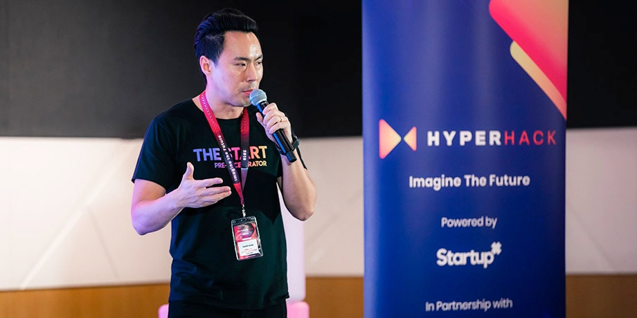 Temasek’s Sang Shin speaking at HyperHack