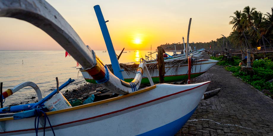 Sun rises at a beach in Les Village